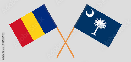 Crossed flags of Romania and The State of South Carolina. Official colors. Correct proportion
