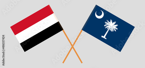 Crossed flags of Yemen and The State of South Carolina. Official colors. Correct proportion