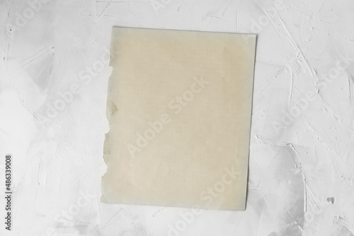 Empty space for the text. An old blank notebook sheet  on a light background.