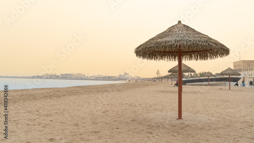 Family beach in the Wakrah souq  Traditional Market  along with traditional boats