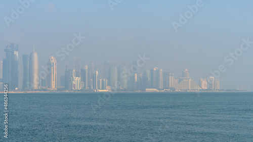 view of Westbay area with many iconic towers and builidings on misty day morning