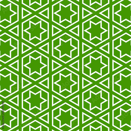 Arabesque ornament. Traditional eastern pattern on green background