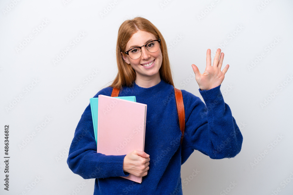 Young student redhead woman isolated on white background counting five with fingers Young student redhead woman isolated on white background counting five with fingers