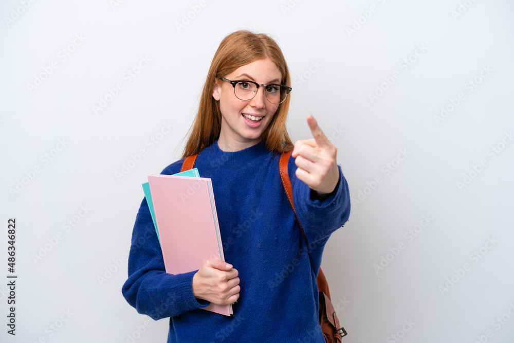 Young student redhead woman isolated on white background doing coming gesture Young student redhead woman isolated on white background doing coming gesture
