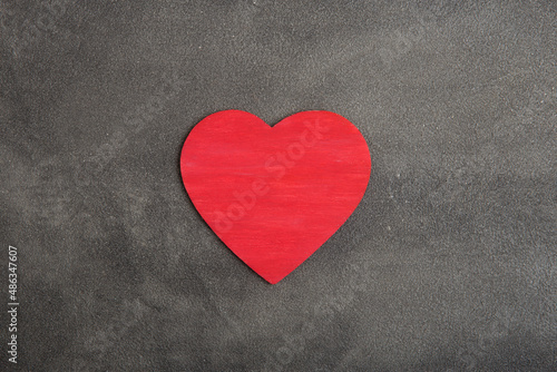 Valentine's Day greetings concept. Red heart shaped card with empty space for your text. Valentines greeting card.