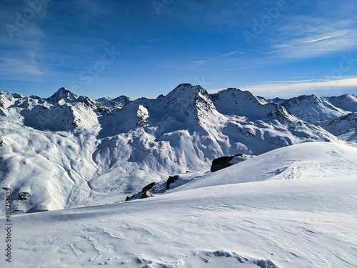 Skitour on the sentisch horn. Mountaineering in a wonderful mountain world in davos switzerland. snowy mountain peaks