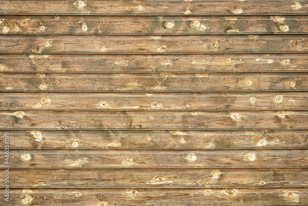 The woody texture of an old board wall, background. The woody texture of an old board wall, background.
