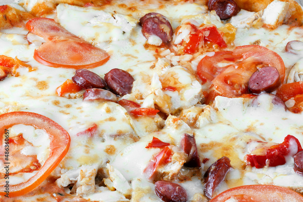 Hot Italian pizza close-up. Delicious Italian fast food. Full depth of field.