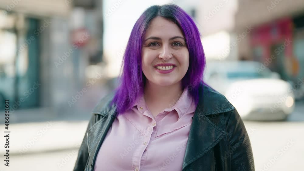 Young plus size woman smiling confident standing at street Young plus size woman smiling confident standing at street