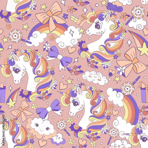 Seamless pattern cute unicorns heads vector background © alinart