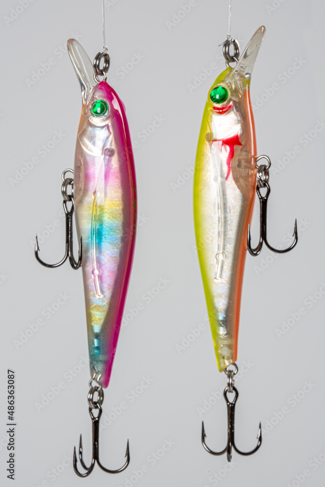 Fishing Lure (Wobbler) fishing temptations on white background. Many Fishing Spinning, fake bait, artificial lure. Colection of Silicon Fishing Twister with Hook and Sinker. Fishing Lure (Wobbler) fishing temptations on white background. Many Fishing Spinning, fake bait, artificial lure. Colection of Silicon Fishing Twister with Hook and Sinker.