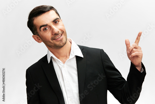 successful man in a stylish suit smile posing self-confidence isolated background