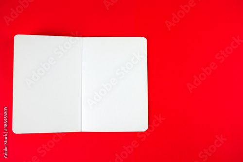 Empty blank paper notebook or book mockup on red background. White empty paper notepad Free Download Empty blank paper notebook or book mockup on red background. White empty paper notepad - GFXLoad
