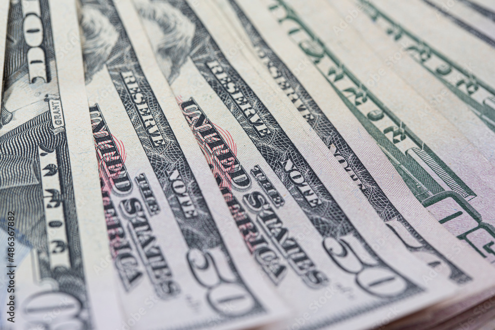 Money, US dollar bills background. Money scattered on the table. Photography for finance and economy concepts. American Dollar Cash. Money, US dollar bills background. Money scattered on the table. Photography for finance and economy concepts. American Dollar Cash.