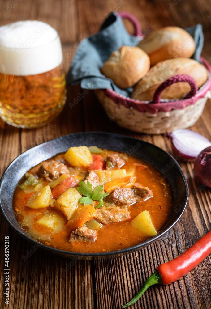 Beef and pork goulash with potato and pepper