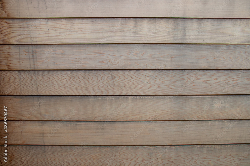 Fototapeta premium Red cedar cladding wood grain background, aged and weathered before renovation