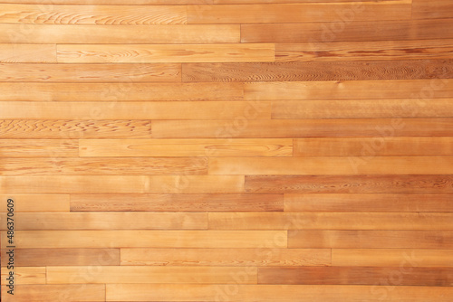 Freshly oiled red cedar wood lumber after renovation, renewed, cleaned and stained wood texture background photo