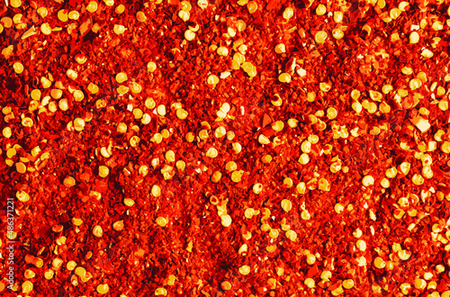 Realistic vector illustration of crushed dry chili peppers background.
