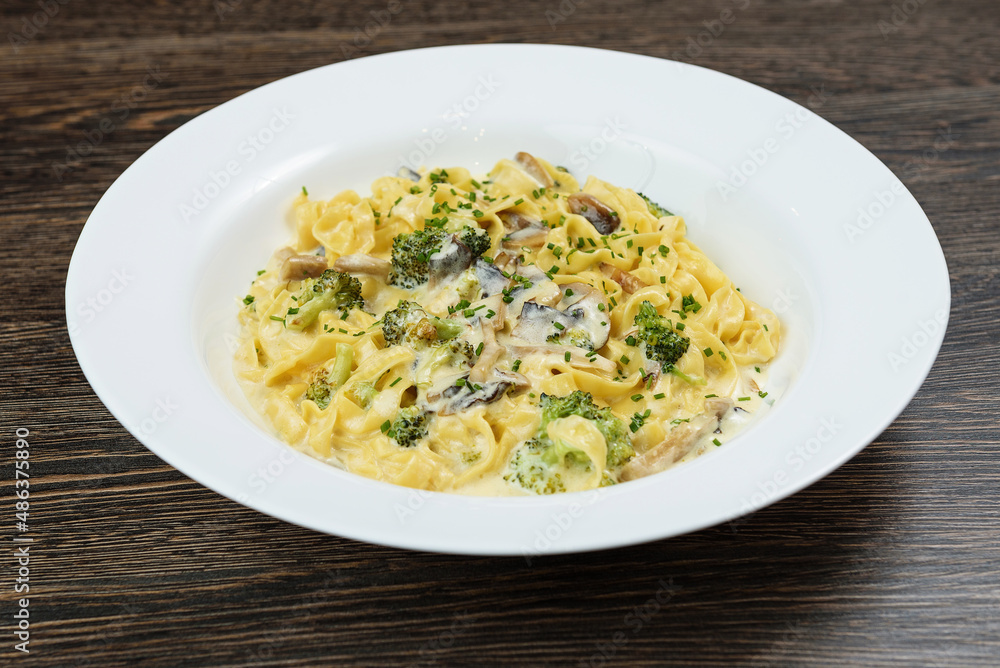 Hot dishes with pasta, cheese, vegetables and meat Hot dishes with pasta, cheese, vegetables and meat