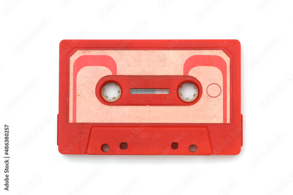 Red Retro Audio Tape isolated on white background. Vintage Red Cassette tape on a white  background with copy space