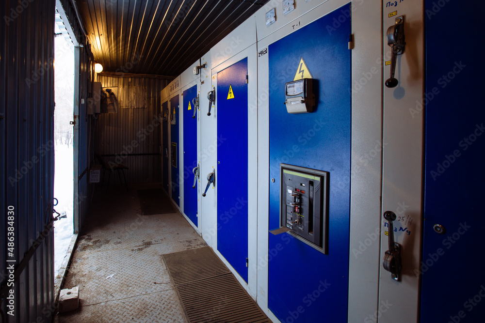 Transformer box. Locked metal doors of switchgear cabinets Transformer box. Locked metal doors of switchgear cabinets