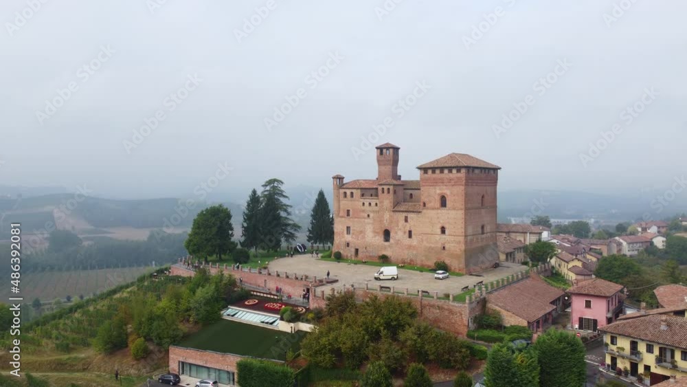 Grinzane Cavour aerial view and Medieval castle in Langhe vineyard, Piedmont Italy (Piemonte) Grinzane Cavour aerial view and Medieval castle in Langhe vineyard, Piedmont Italy (Piemonte)