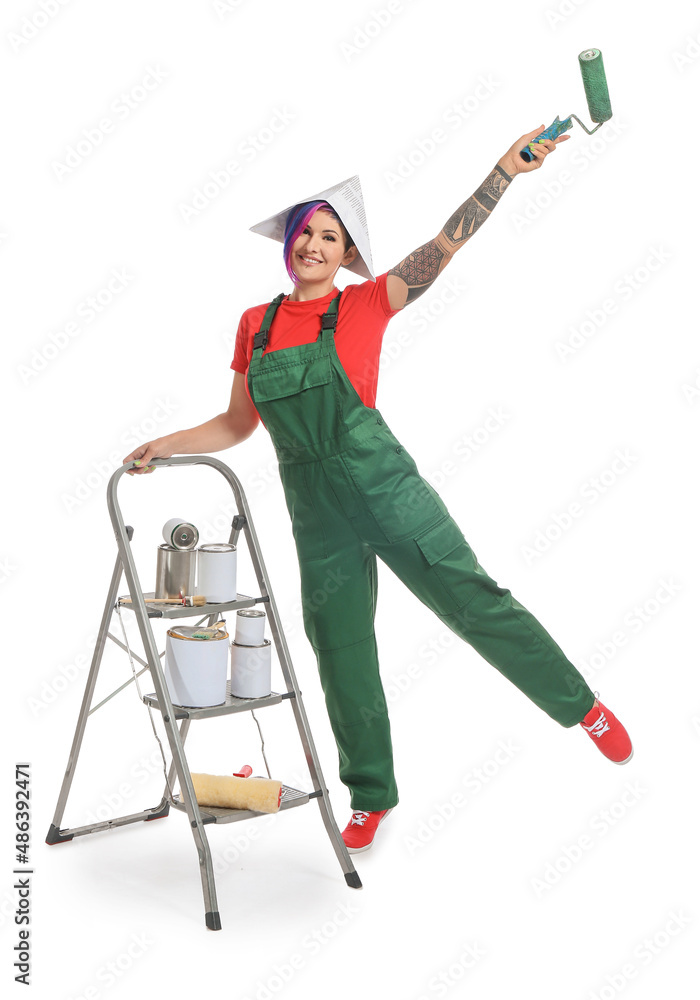 Female painter with paper hat, paint roller and ladder on white background Female painter with paper hat, paint roller and ladder on white background