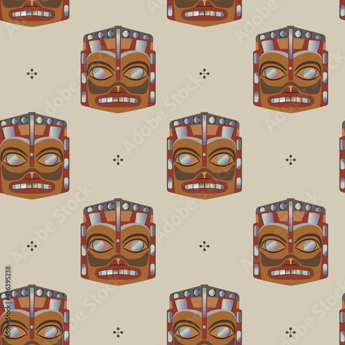 Seamless ethnic pattern with Native American ethnic masks of Haida Indians. On white background.