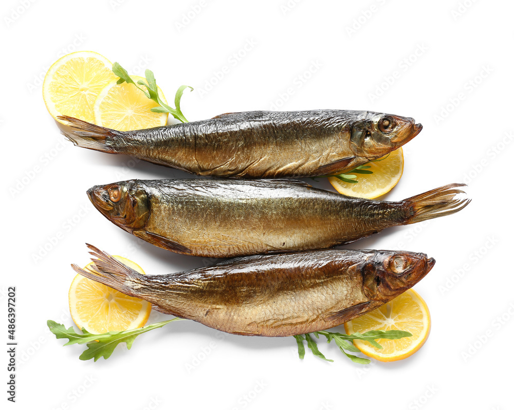 Smoked herring fishes on white background Smoked herring fishes on white background
