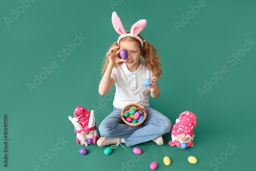 Funny little girl with bunn...