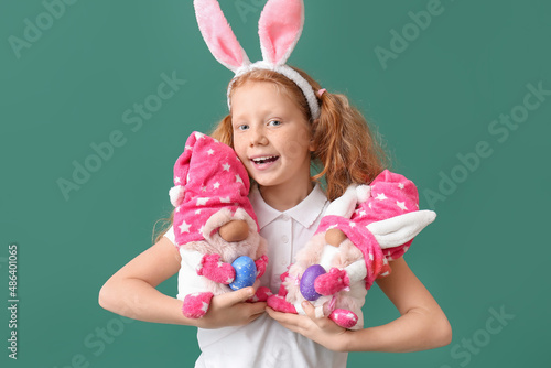 Funny little girl with bunn...
