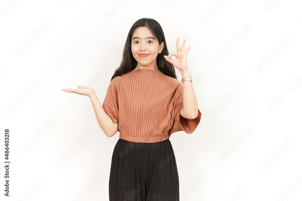 Showing and Presenting Product on Open Palm Of Beautiful Asian Woman Isolated On White Background Showing and Presenting Product on Open Palm Of Beautiful Asian Woman Isolated On White Background