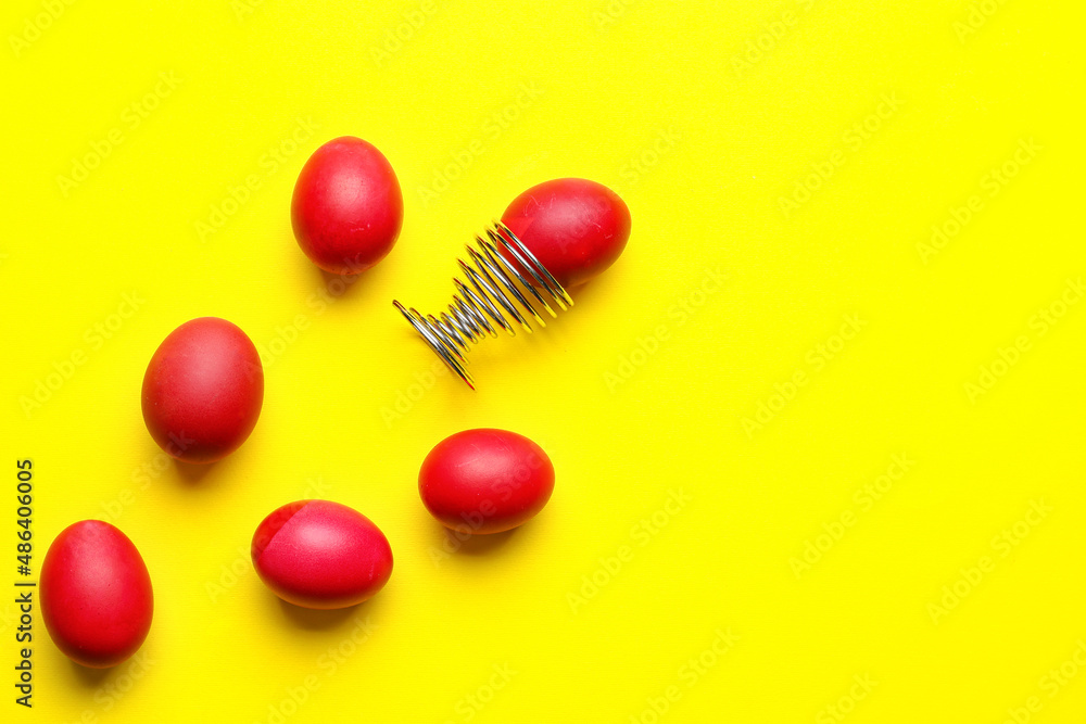 Obraz premium Composition with beautiful Easter eggs on yellow background