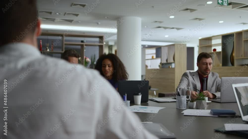 Multiracial colleagues team working together brainstorm business ideas in office Multiracial colleagues team working together brainstorm business ideas in office