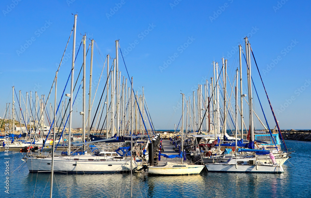 Sailboats and motorboats boats in marina of the Mediterranean Sea 