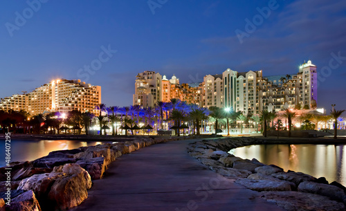 Night colorful scene seen from stone walking pier and promenade at the centra...