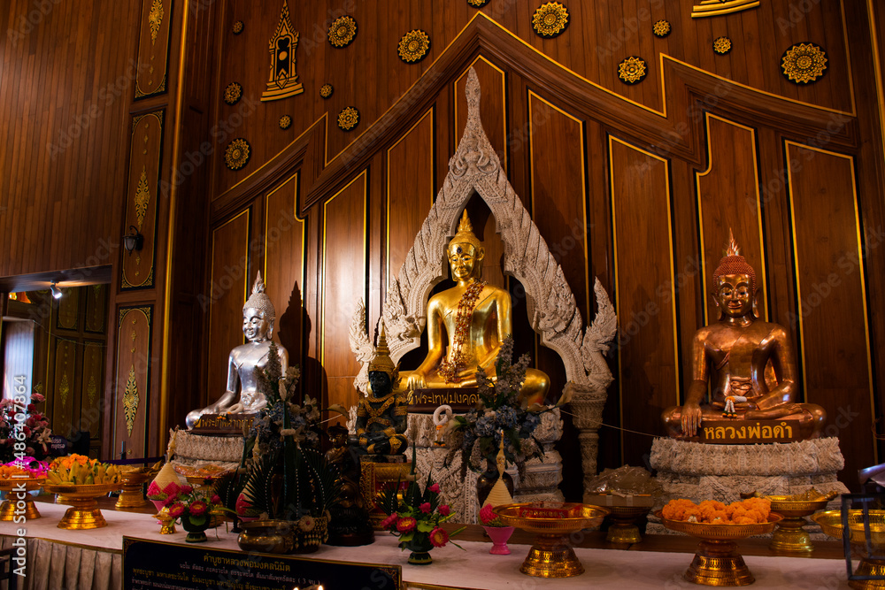 Buddha statue for thai people and foreign travelers travel visit and respect praying with holy mystery at Wat Charoen Rat Bamrung or Nong Pong Nok temple on January 27, 2022 in Nakhon Pathom, Thailand