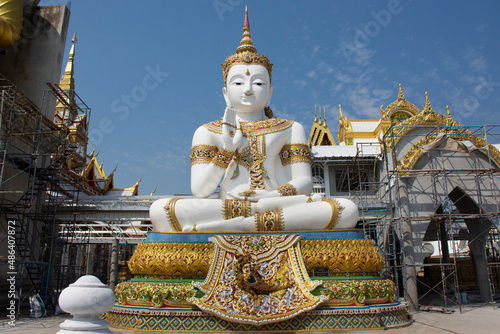 Beauty Phra Si Ariya Mettrai buddha statue for thai people travel visit respect praying holy mystery at Wat Charoen Rat Bamrung or Nong Pong Nok temple at Kamphaeng Saen in Nakhon Pathom, Thailand photo