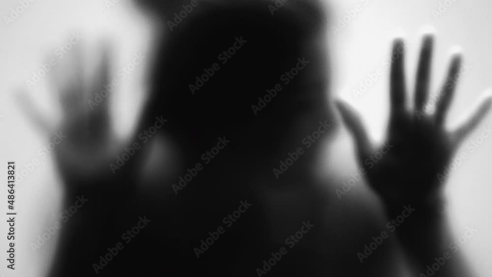 Spooky person behind glass scary person stuck in anxiety and depression concept monochrome Spooky person behind glass scary person stuck in anxiety and depression concept monochrome