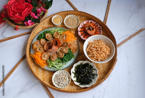 Chinese New Year must have dish. Seafood Yusheng aka Prosperity Toss with Abalone. Homemade Cantonese style 