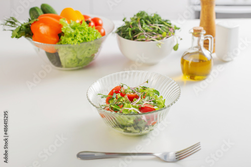 healthy vegetarian salad on white table