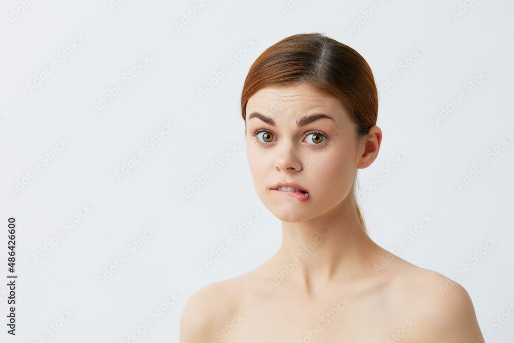 woman red hair bare shoulders cosmetics skincare isolated background woman red hair bare shoulders cosmetics skincare isolated background