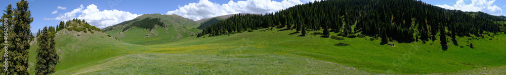Beautiful green mountains with cloudy sky on background in spring season. Mountain valley landscape. Beautiful green mountains with cloudy sky on background in spring season. Mountain valley landscape.
