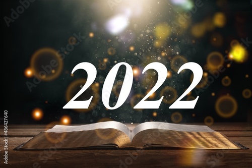 New year concept of 2022. Reading a book. New start.