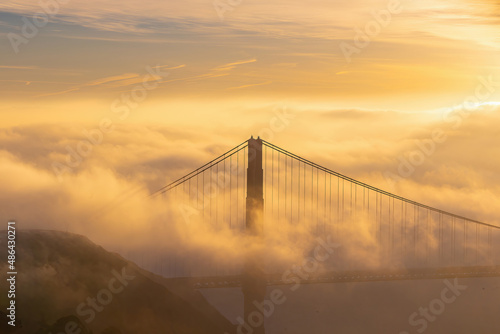 Golden Gate Bridge with low fog in USA