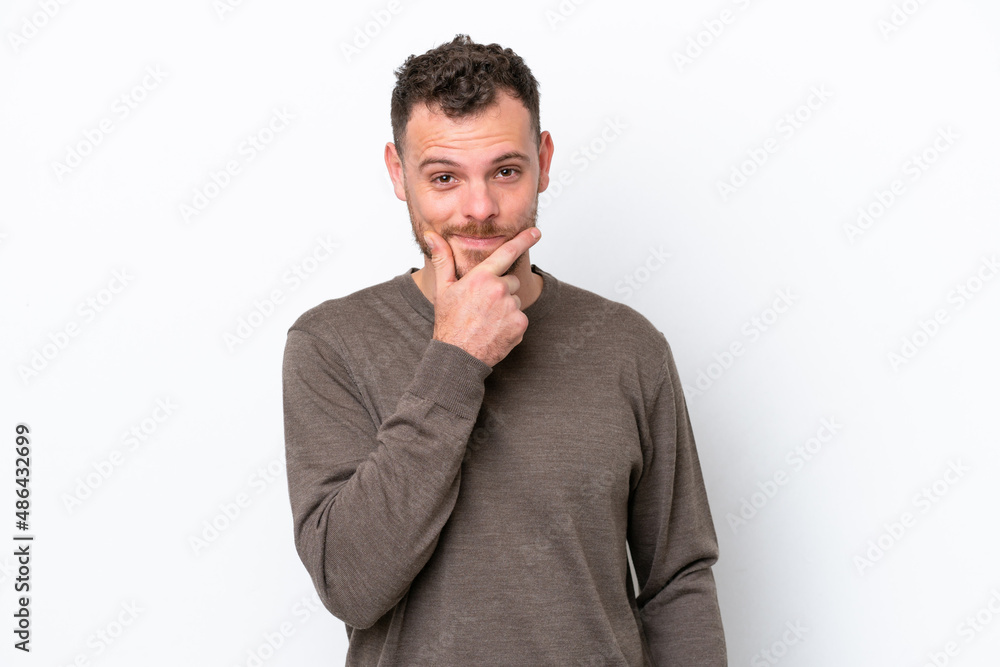 Young Brazilian man isolated on white background thinking Young Brazilian man isolated on white background thinking