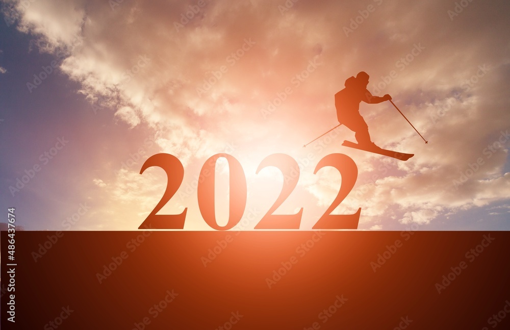 New year concept of 2022. Cheerful group of people at sunset. New year card. New year concept of 2022. Cheerful group of people at sunset. New year card.