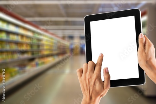 Smart retail management system.Worker hands holding digital tablet