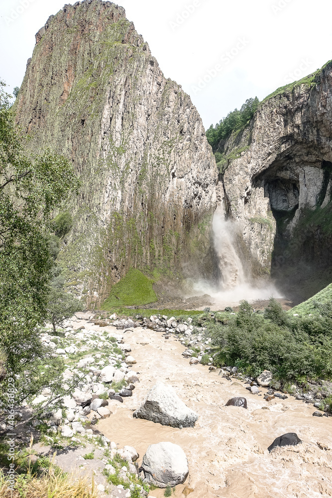 Tuzluk-Shapa Waterfall, surrounded by the Caucasus Mountains near Elbrus, Jily-su, Russia