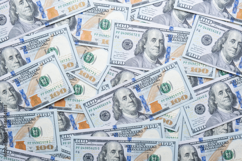Texture of dollar bills. One hundred dollars. Close-up. Texture of dollar bills. One hundred dollars. Close-up.